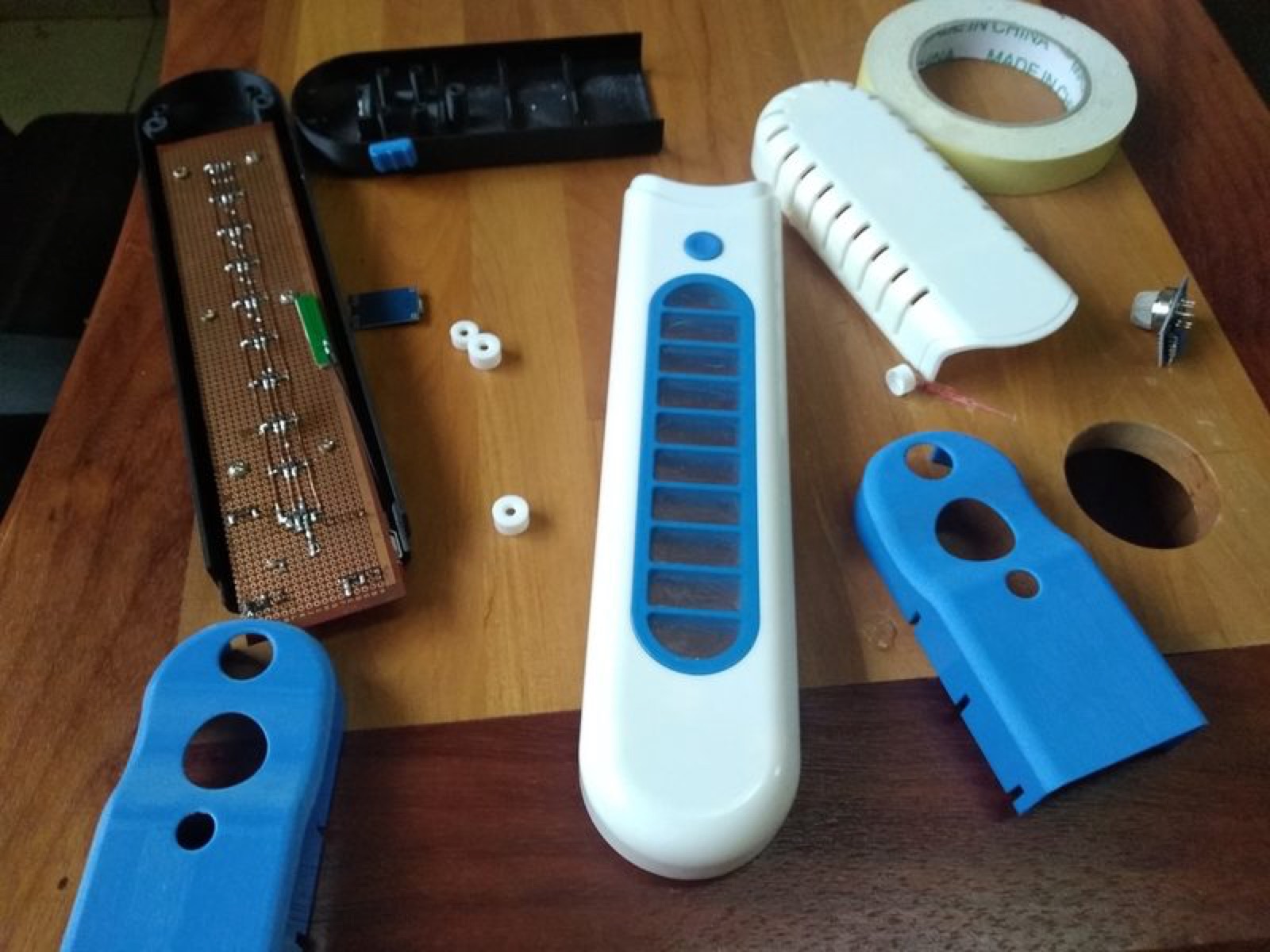 V4 enclosure parts and electronics on the bench